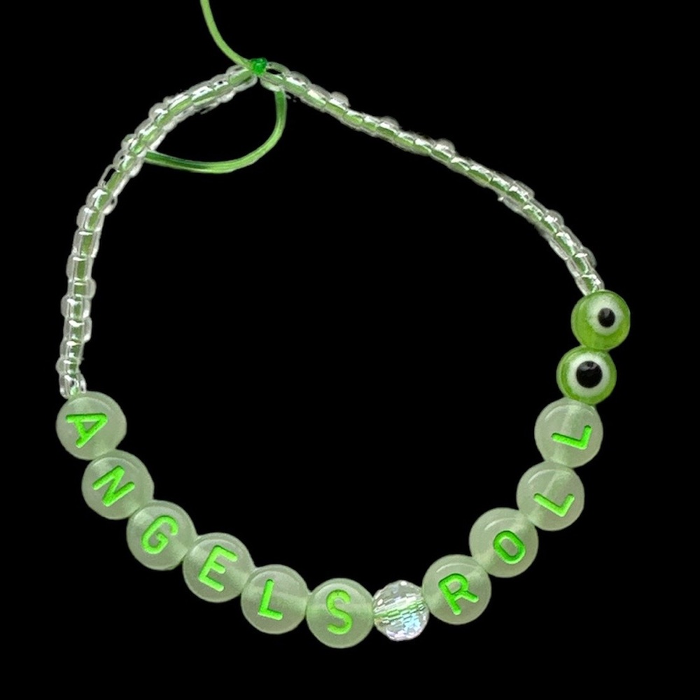 Angels Roll Their Eyes Eras Tour Homemade stretchy bracelet glow in the dark